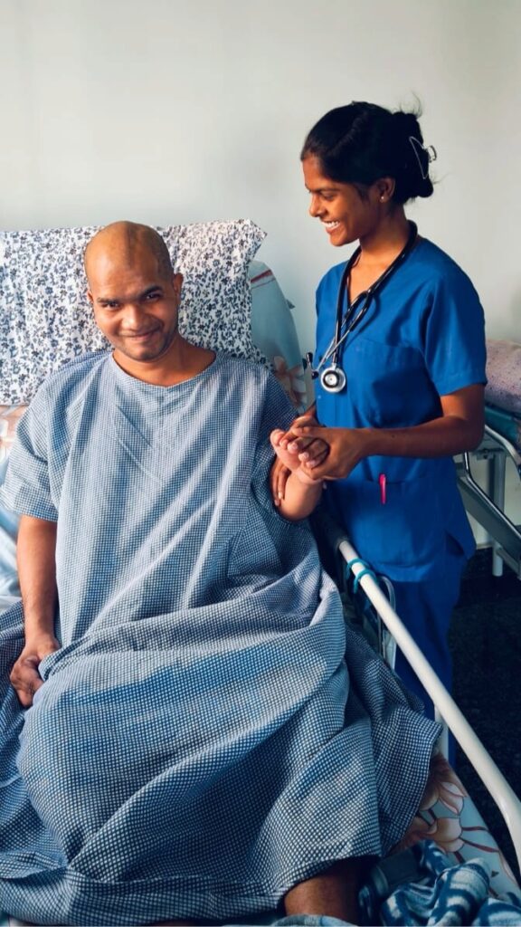 Indian nurse assisting a senior patient during neuro rehabilitation therapy at Nova Rehabilitation Center Hyderabad