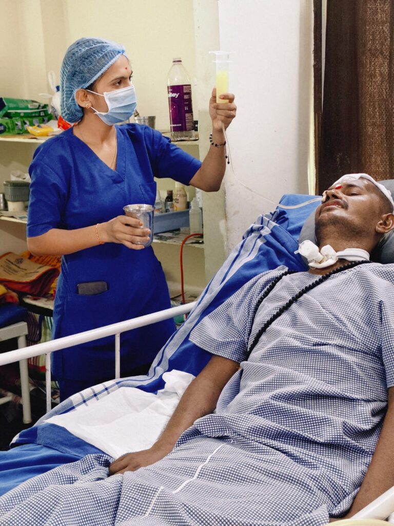 espiratory therapist performing tracheostomy care at the best rehabilitation center with ICU backup